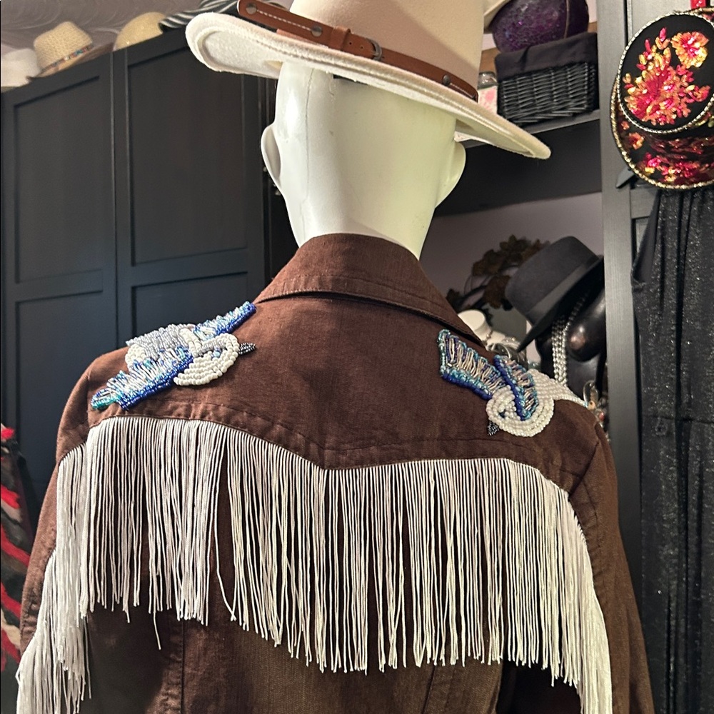 # 123    Fabulous handcrafted bird jacket